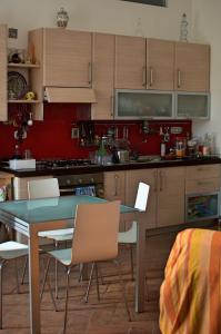 Η κουζίνα ή μικρή κουζίνα στο Il Giardino del Sole