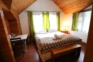 Cama ou camas em um quarto em Santa Maria Pucon