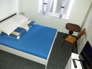 Posteľ alebo postele v izbe v ubytovaní olszanka