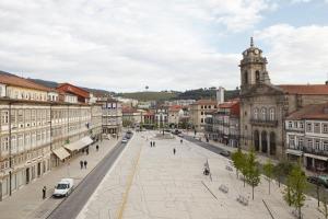 a view of a city with a street and buildings at The Office Guest in Guimarães