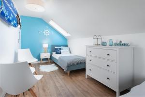 Postel nebo postele na pokoji v ubytování ApartDomek7b Jasne Wybrzeże - nowy i luksusowy