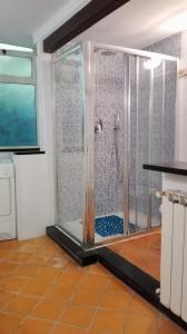 a bathroom with a shower in a room at Casa Alba in Monterosso al Mare