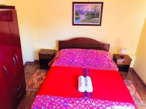 Ένα ή περισσότερα κρεβάτια σε δωμάτιο στο Hostal Intipara