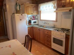 Kuchyň nebo kuchyňský kout v ubytování Apartman Nadia