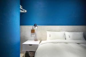 Letto o letti in una camera di We Come Hostel