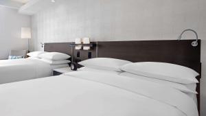 Postel nebo postele na pokoji v ubytování Hyatt Centric Brickell Miami