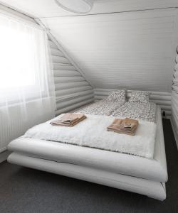 Gallery image of Öböl Liget vendégházak in Abádszalók