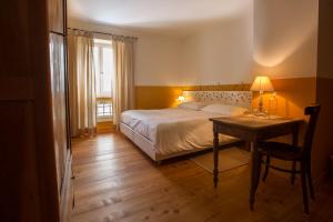 Postel nebo postele na pokoji v ubytování La Collina delle Mignole