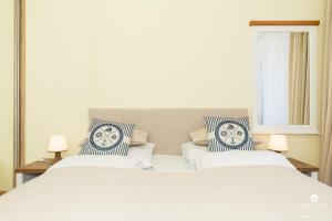 Posteľ alebo postele v izbe v ubytovaní Jantar Apartamenty Exclusive Polanki Park SPA