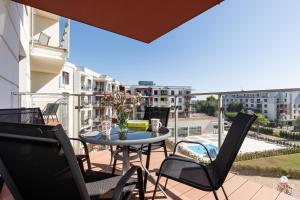 Balkón alebo terasa v ubytovaní Jantar Apartamenty Exclusive Polanki Park SPA