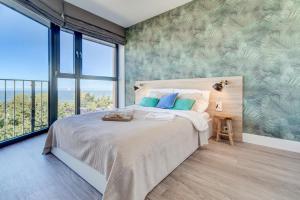 Posteľ alebo postele v izbe v ubytovaní Apartamenty Horyzont SeaView by Rent like home