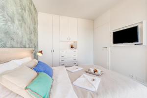 Posteľ alebo postele v izbe v ubytovaní Apartamenty Horyzont SeaView by Rent like home