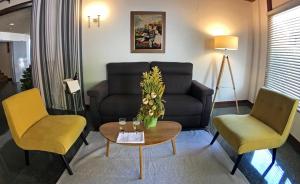 Posezení v ubytování Hotel Port-Bo