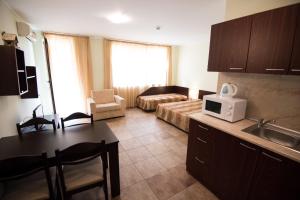 Kuchyň nebo kuchyňský kout v ubytování Family hotel Apolon