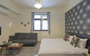Łóżko lub łóżka w pokoju w obiekcie Fish House Hostel