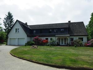 Taman di luar Landhaus-Lässig
