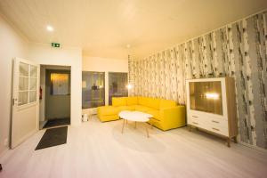 Posezení v ubytování Capsule Hotel Ibedcity