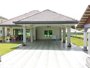 a large patio with a roof on top of it at Lot 4 PD Villa in Port Dickson