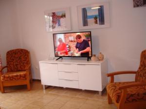 TV a/nebo společenská místnost v ubytování Terraced House - Zand Properties