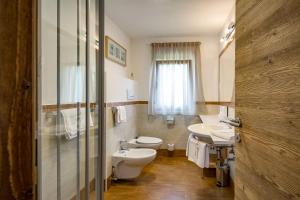 Ванная комната в La Bercia Dolomites Chalet