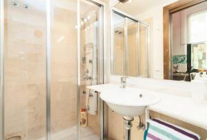 a bathroom with a sink and a shower at Malaga Dreams Oldtown PARKING-WIFI-AC by Easytrip in Málaga