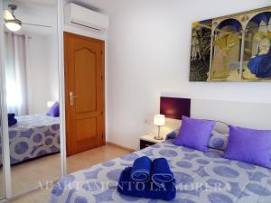 Posteľ alebo postele v izbe v ubytovaní Apartamento La Morera