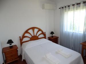 Postel nebo postele na pokoji v ubytování Falfeira Apartments + 39 fotografií
