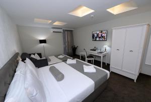 Krevet ili kreveti u jedinici u okviru objekta Hotel Alexandar II
