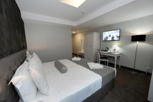 Krevet ili kreveti u jedinici u okviru objekta Hotel Alexandar II