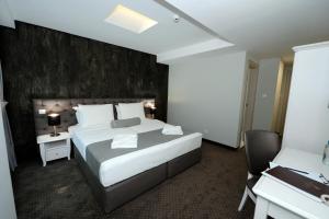 Krevet ili kreveti u jedinici u okviru objekta Hotel Alexandar II