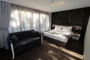 Krevet ili kreveti u jedinici u okviru objekta Hotel Alexandar II