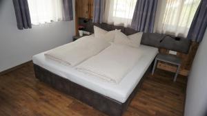 Postel nebo postele na pokoji v ubytování Apartment Wandspitz