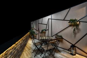 Svalir eða verönd á One Luxury Suites