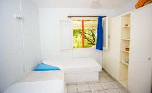 A bed or beds in a room at Haus Manya in Lassy