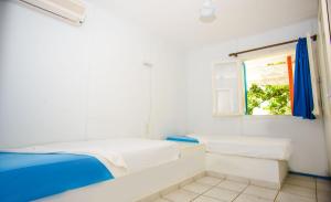 A bed or beds in a room at Haus Manya in Lassy