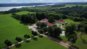 an aerial view of a house in a field at Bramslevgaard in Hobro
