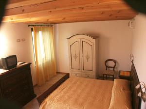 Posteľ alebo postele v izbe v ubytovaní Agriturismo Colombarola