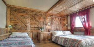 Postel nebo postele na pokoji v ubytování Hotel Meublé Mon Rêve