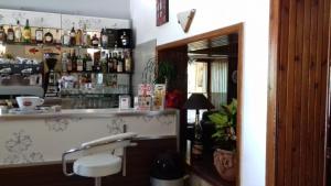 Lounge alebo bar v ubytovaní Hotel Pinguino
