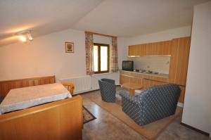 Kuchyň nebo kuchyňský kout v ubytování Appartement Kristall
