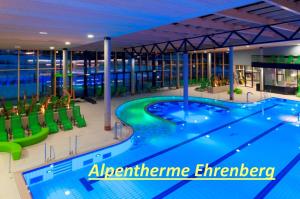 a large swimming pool on the top of a building at Gästehaus am Graben in Reutte