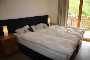 Ski Paradise SP 012 - MOUNTAIN apartment 8 pers房間的床