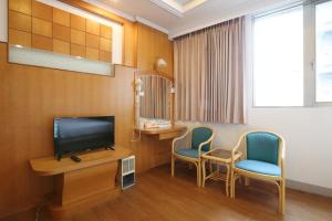 TV o dispositivi per l'intrattenimento presso Long Shan Hotel