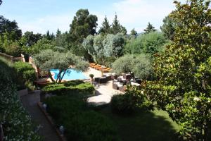 an overhead view of a garden with a pool at Athénopolis in Grimaud