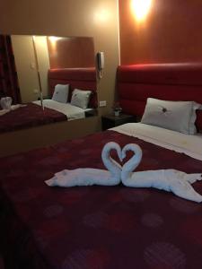 Postel nebo postele na pokoji v ubytování Hotel Manantial No,001