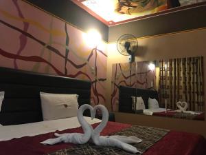 Postel nebo postele na pokoji v ubytování Hotel Manantial No,001