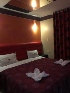 Postel nebo postele na pokoji v ubytování Hotel Manantial No,001