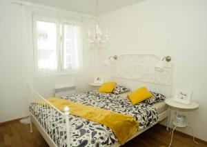 Posteľ alebo postele v izbe v ubytovaní Golden Gate Apartment Zadar