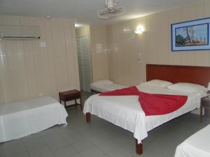 Postel nebo postele na pokoji v ubytování Hotel Nitana