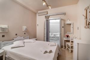 Letto o letti in una camera di Amaryllis Hotel